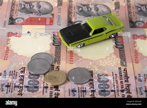 Car on money Stock Photo - Alamy