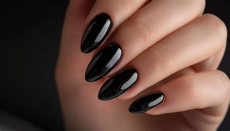 Premium Photo | Elegant black stiletto nails glossy finish