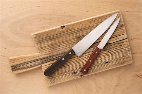 Premium Photo Cutting Wooden Board And Kitchen Knives