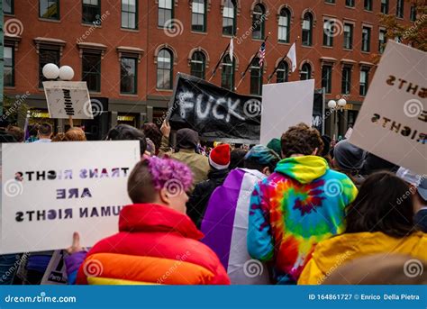 Protester Marching For A Peace Pride Rainbow Flag At The Boston March