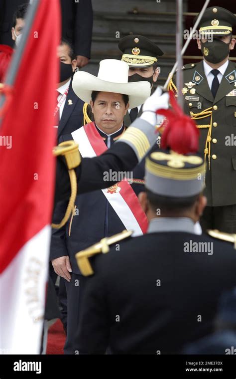 Perus Newly Sworn In President Pedro Castillo Acknowledges Soldiers Holding Their Nations Flag