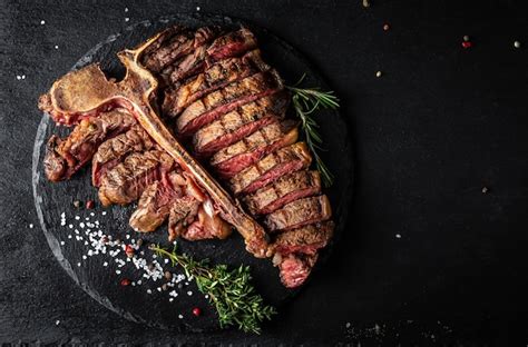 Filete De Carne De Res En Rodajas Y Asado T Bone O Porterhouse Para El