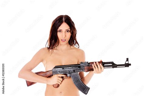 Sexy Nude Brunette Girl Model With Weapon Stock Photo Adobe Stock
