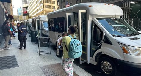 Migrants In Nyc Sleep In Buses On Street As Intake Center Runs Out Of