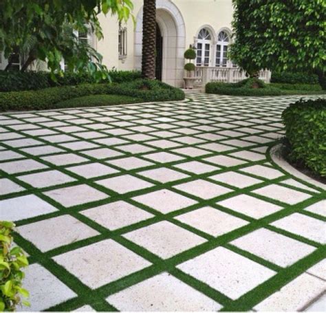 Use Of Artificial Grass For Driveway Backyard Grass Landscaping Backyard Landscaping Pavers