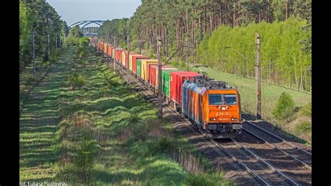 PCC Intermodal Traxxy pomarańczowo granatowe z kontenerami Brzeg