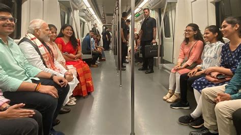 Pm Modi Travels On Metro To Attend Delhi University Event