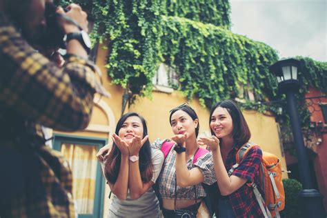 Group Of Happy Friends Taking Selfies Together In An Urban Area 1926098