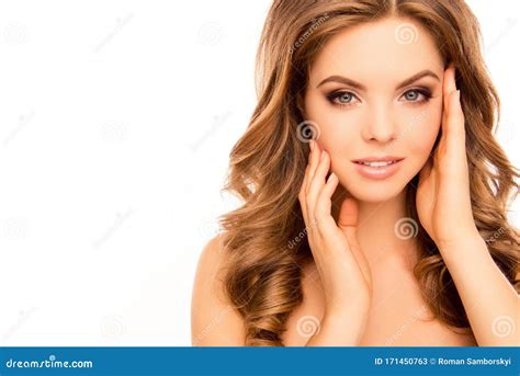 Portrait Of Pretty Woman With Perfect Skin Touching Her Face Stock