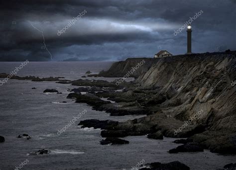 Lighthouse during a heavy storm at night — Stock Photo © RainerPlendl #4445304