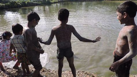 Boy Swimming In River