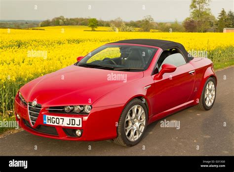 Alfa Romeo Spider soft top convertible sports car in red with black ...