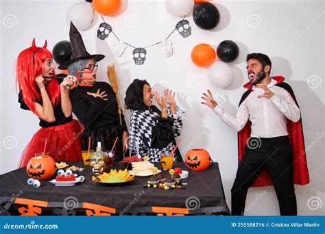 Man Dressed As Vampire Scaring People at a Costume Halloween Party. Stock Photo - Image of ...