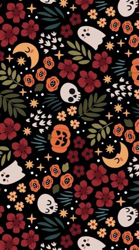 A Black Background With Skulls And Flowers