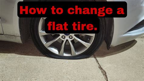 How To Change A Flat Tire On A Ford Fusion Youtube