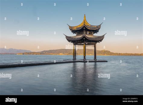 Sunrise View Of Jixian Pavilion The Historic Landmark In At West Lake