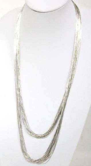 Liquid Silver Necklace, it's 60" of strands and strands of silky silver ...