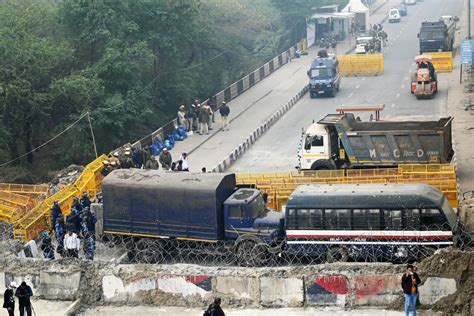 Police Fire Tear Gas To Disperse Protesting Farmers Outside Delhi