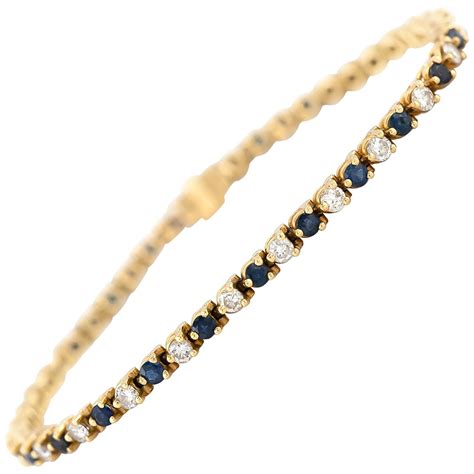 14 Karat Yellow Gold Diamond And Sapphire Tennis Bracelet At 1stdibs