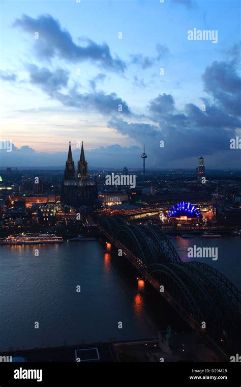 City View Of Cologne At Night With Cologne Cathedral Rhine River