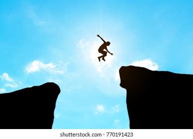 Man Jump Through Gap Between Hill Stock Illustration 770191426