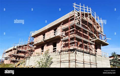 Reconstruction Of Block Of Houses With Scaffolding Scaffold Before