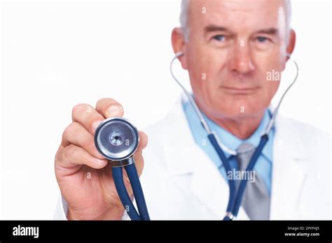 Doctor With Stethoscope Portrait Of Mature Male Doctor Holding