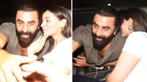 Ranbir Kapoor and Alia Bhatt pose cutely for the paparazzi; share a kiss