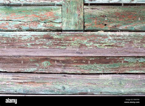 A Weathered Green Turquoise Painting On The Wooden Door Of An Old