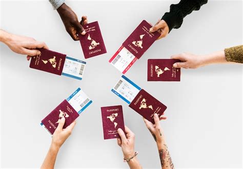 Premium Photo Group Of Hands Holding Passport In Aerial View