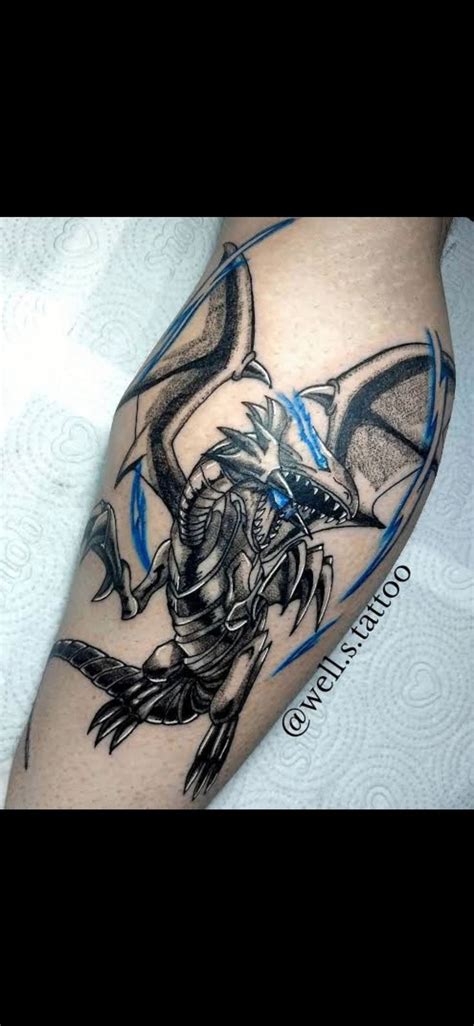 Blue eyes white dragon tattoo | Yugioh tattoo, Geek tattoo, Digimon tattoo