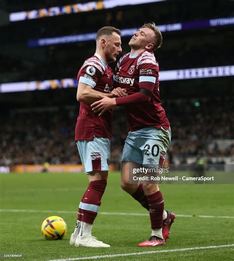 West Ham Uniteds Jarrod Bowen Is Helped Up By Vladimir Coufal After