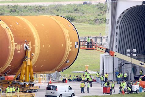 Core Of Nasas First Artemis Moon Rocket Towed Into Vehicle Assembly