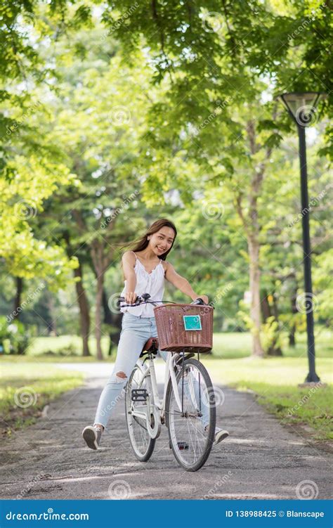 Happy Woman Legs Up Riding Bike Stock Image Image Of Concept