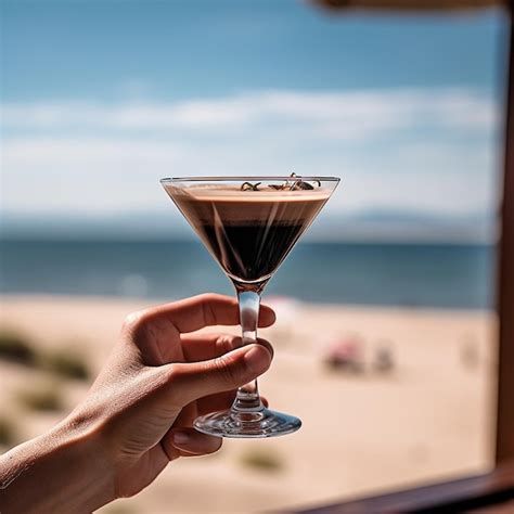 Premium Photo A Person Holding A Martini Glass