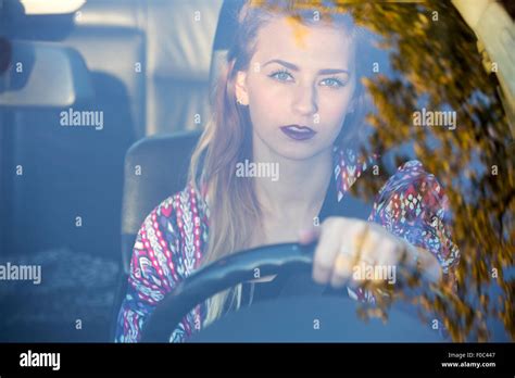 A Brunette Woman Sitting In A Car Stock Photo Alamy