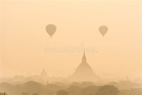 Hot Air Balloon Over Plain Of Bagan In Misty Morning Before Sunrise Myanmar Stock Photo Image