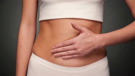 Woman With Naked Stomach Rubbing Her Belly Stock Footage VideoHive