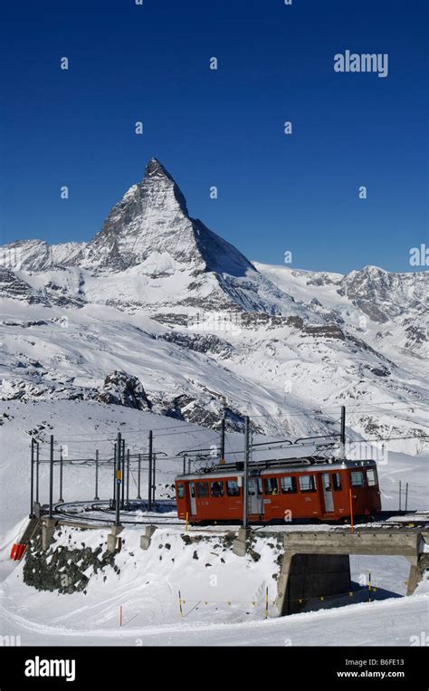 The Gornergratbahn Mountain Rack Railway In Front Of The Matterhorn