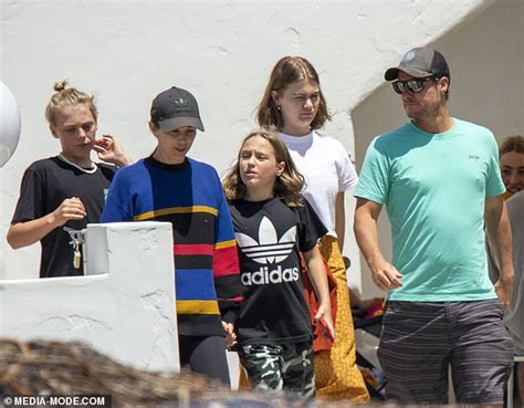 Lleyton and Bec Hewitt enjoy a family outing with their three children ...