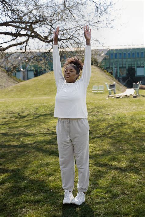 Free Photo Full Shot Smiley Woman Stretching Outdoors