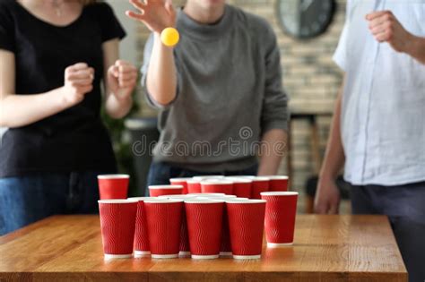 People Playing Beer Pong In Bar Stock Photo Image Of Competition