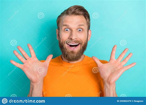 Photo Of Impressed Beard Guy Wear Orange T Shirt Isolated On Turquoise