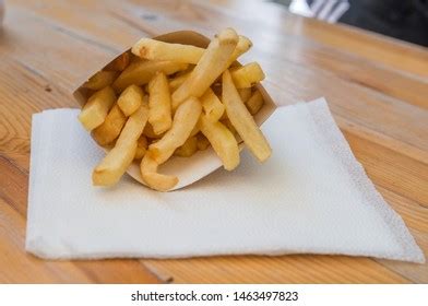 Portion Golden Crispy Fried Pommes Frites Stock Photo