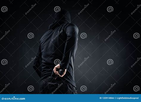 Thief Hiding Gun Behind Stock Photo Image Of Robbery 120914866