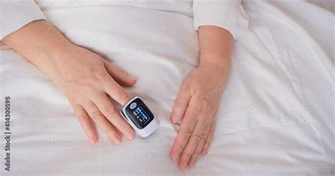 Pulse Oximeter At Home Or Clinic Show Oxygen Saturation Level In Blood