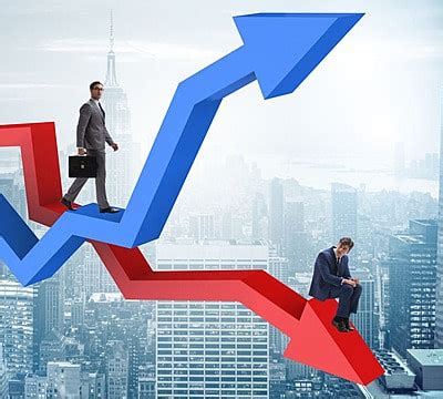 The Businessman With Charts Of Growth And Decline Businessman With