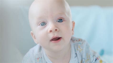 close-up portrait of blue eyed baby boy Stock Video Footage 00:22 SBV-338598673 - Storyblocks