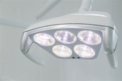 A Dentist Light Or Dental Lamp Against The Ceiling Of The Room Stock