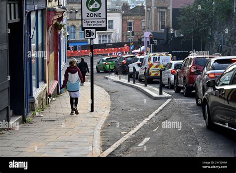 Bike Lane Separated From Traffic With Bollards And Concrete Kerb And